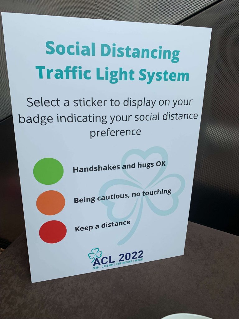 A traffic light system for social distancing. Green means "handshakes and hugs ok", amber means "being cautious, no touching" and red indicates "keep a distance".
